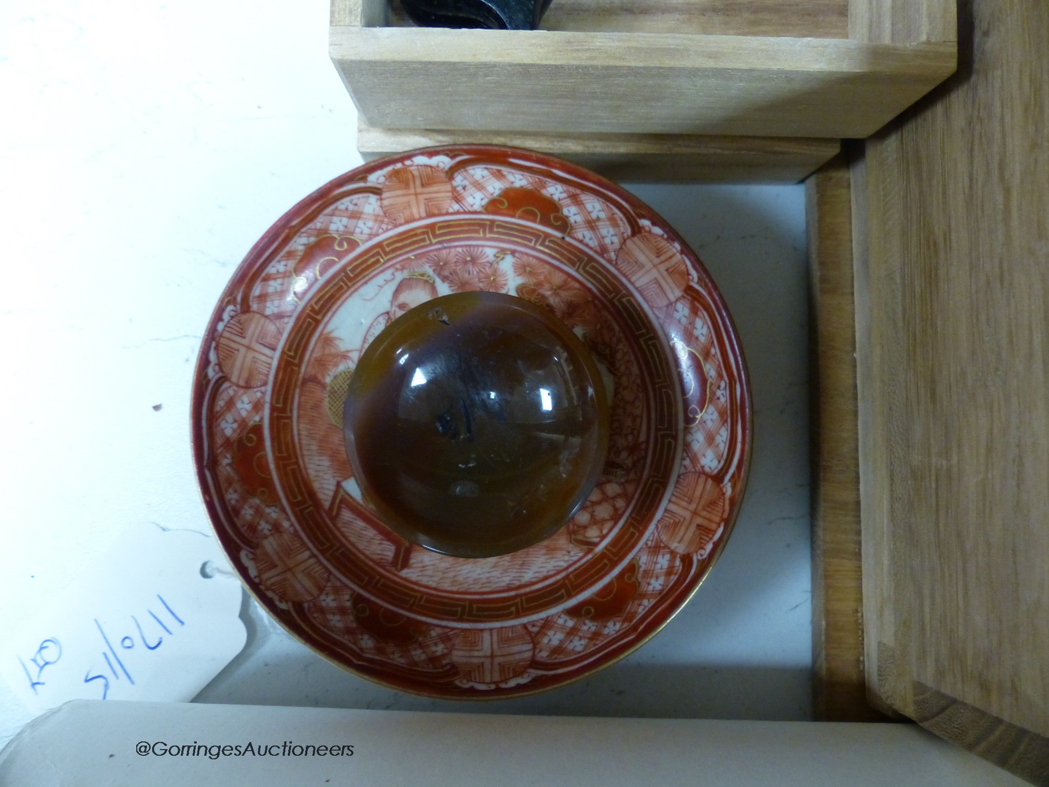 A modern Japanese lacquer dish, diameter 38cm, a vase, various hardstone carvings, etc.